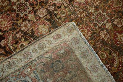 7x9.5 Vintage Distressed Tabriz Carpet